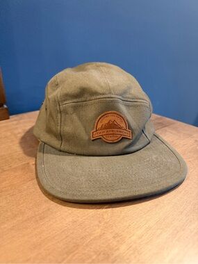 The Classic Olive Green Canvas Five-Panel Hat with Brown Patch